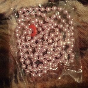 NWOT PINK NECKLACE IN BAG